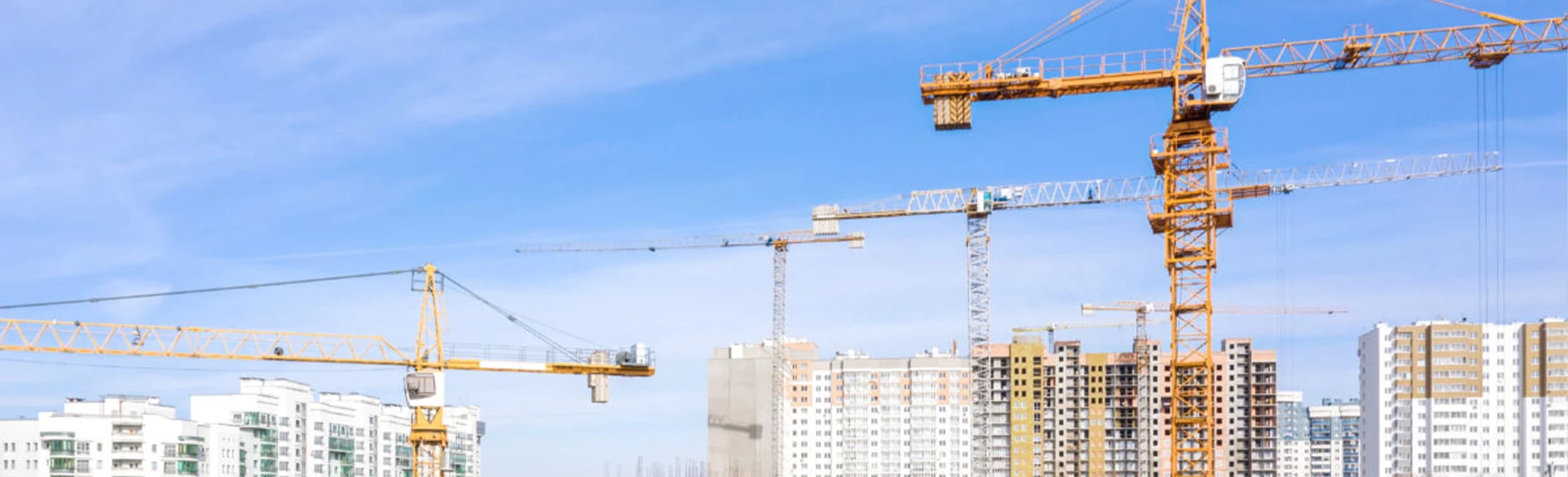 Construction site with cranes - 1200x799