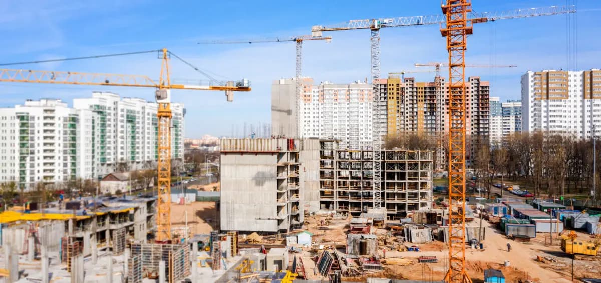 Cranes on a construction site 1200x565