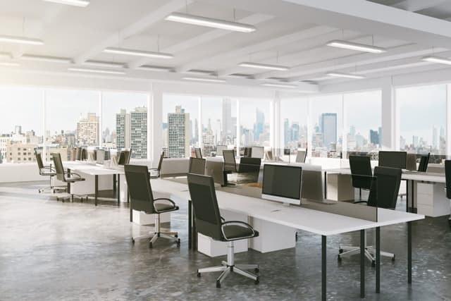 Office floor with empty work stations 1200x800